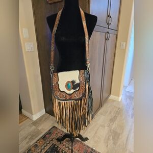 A Haute Southern Hyde purse calf hair crossbody long fringe